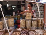 A boy sells chocolates for Eid al-Fitr.